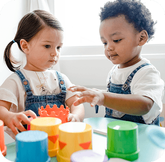 Toddlers playing with toys